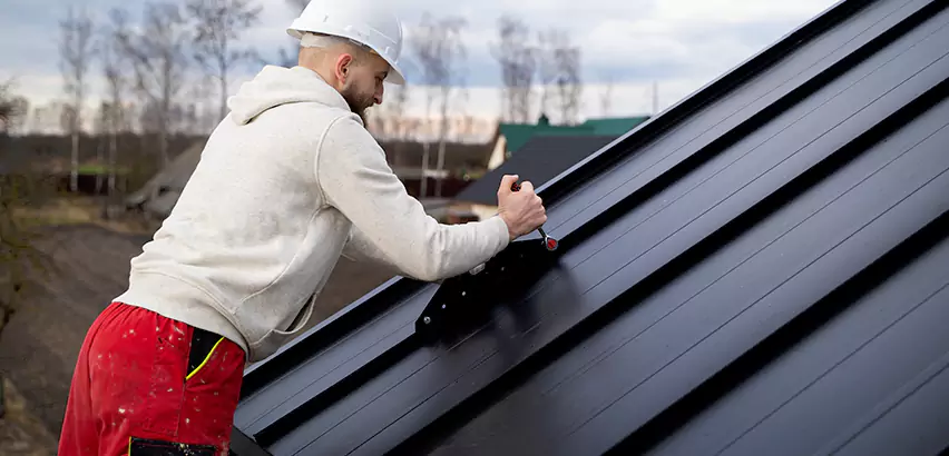 Tin Roof Ridge Cap Installation in evansville